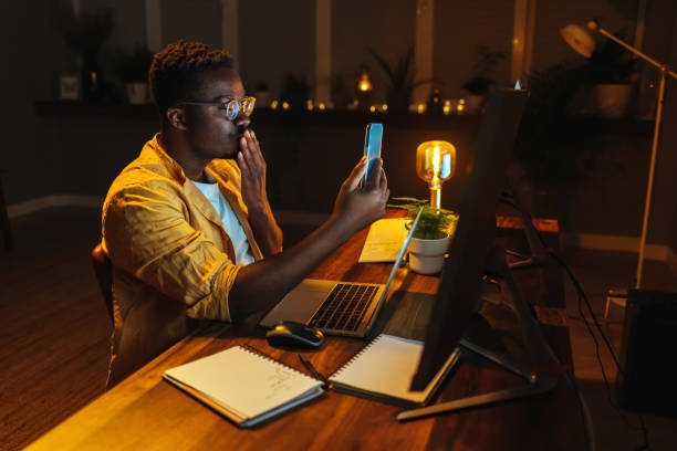 istock Man having a video call with girlfriend. 1417612483