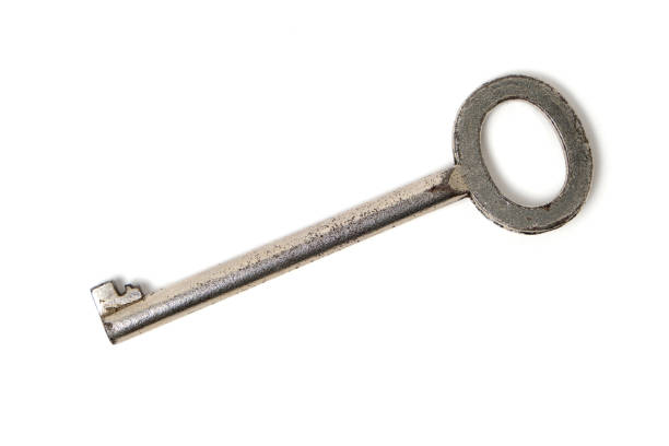 istock Old, retro vintage key white background. 1417614117