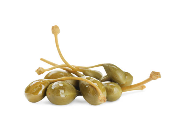 istock Pile of delicious pickled capers on white background 1417616155