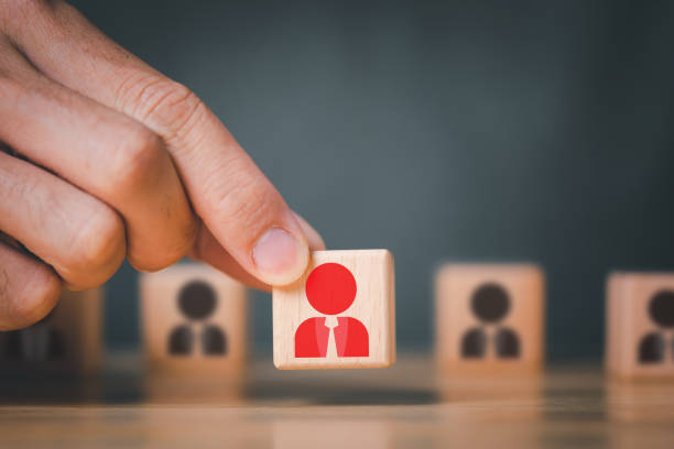 istock Hand holds wood cubes stacking with person data, Customer psychology profile or characteristics, Buyer personal and target customer concept. 1417616256