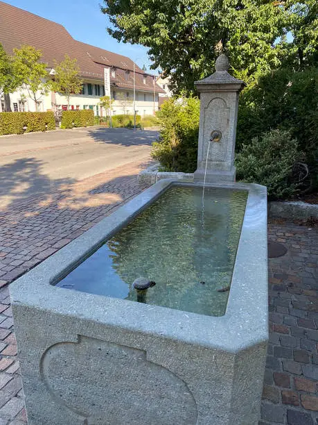 Swiss water fountain in the street, a great place to drink fresh water. Switzerland has lots of water fountains in the city and countryside.