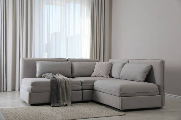 istock Large grey sofa in living room. Interior design 1417617622