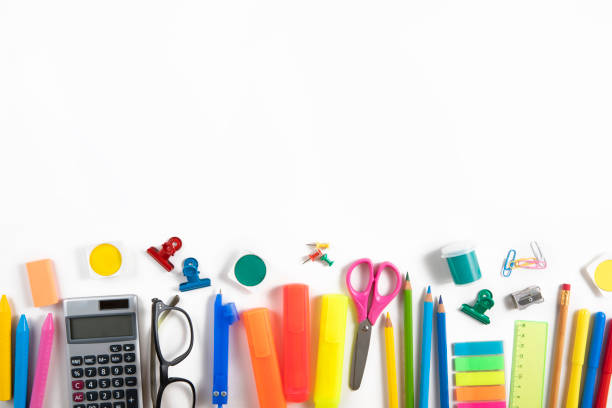Set of school supplies and crayons on white background