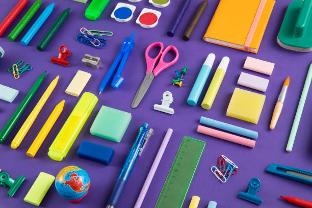 istock School Supplies on Purple Background 1417618142