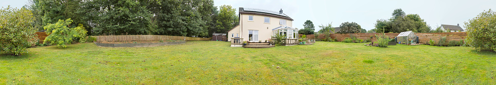Ultra-wide panorama of a domestic home in the suburbs in Pembrokeshire, Wales.