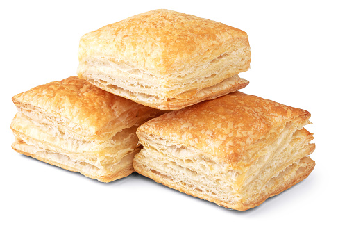 Puff pastry pies on a white background