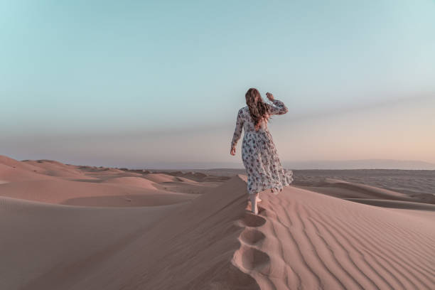 istock Woman in desert 1417636401