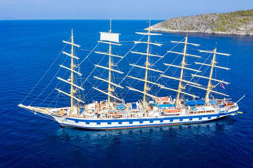 Vis Island, Croatia - August 10 2022: Beautiful sailing ship Star Clippers anchored near Vis Island