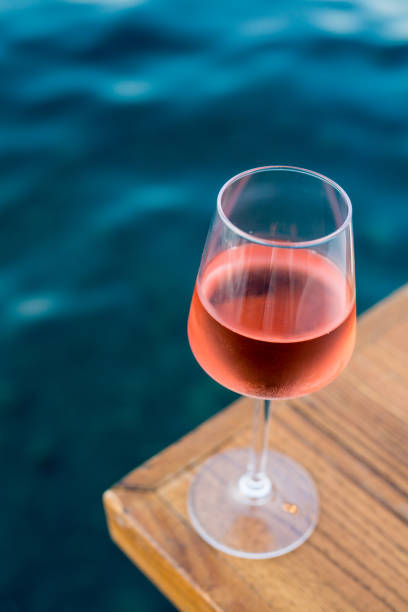 Rose glass of wine stock photo