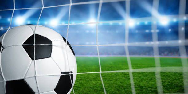 istock Soccer ball in the net 1417647974