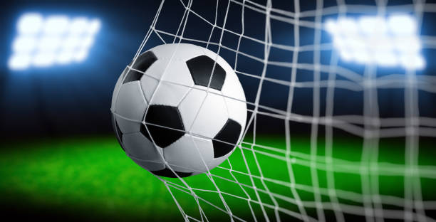 istock Soccer ball in the net 1417648029