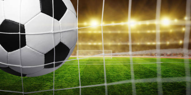 istock Soccer ball in the net 1417648082