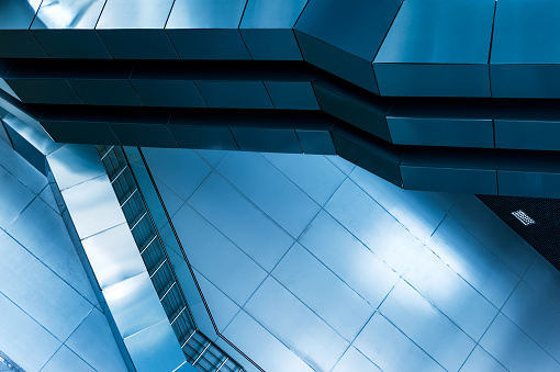 Abstract, futuristic background from metal structures of the interior of the building.