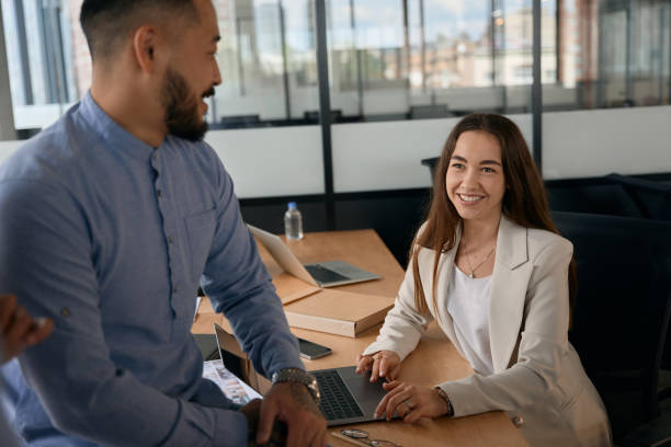 istock Confident man is talking and looking at his beautiful interlocutor 1417648749