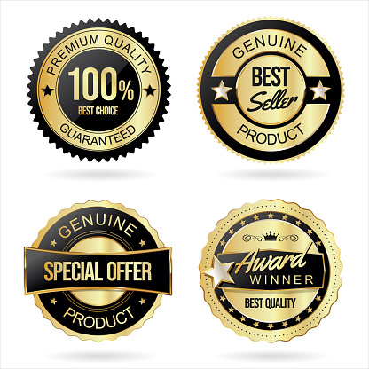 Collection of black and gold quality badges and labels