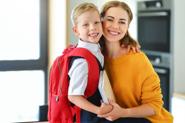 istock Mother preparing son for school studies 1417650753