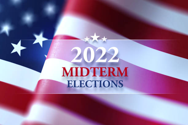 2022 US Midterm Elections Concept - 2022 Election Message Sitting Over Rippled American Flag 2022 Election message written over rippled American flag. Horizontal composition with copy space. Front view. 2022 US Midterm Elections Concept. midterm election stock pictures, royalty-free photos & images