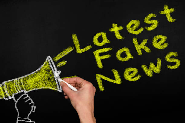 istock Megaphone with Fake news speech bubble banner 1417662502