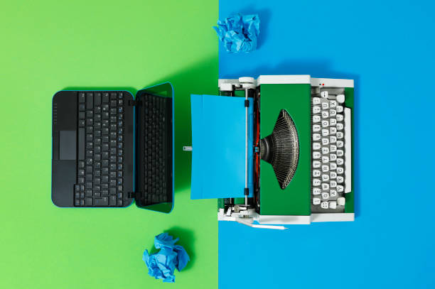 istock Digital und analog – Laptop and 70s Typewriter 1417663134
