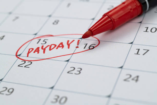 Calendar with red marked payday stock photo