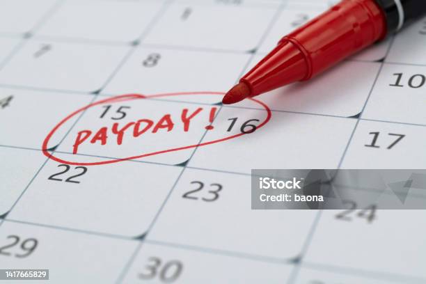 Calendar With Red Marked Payday Stock Photo - Download Image Now - Paycheck, Wages, Day