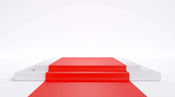 istock White square podium, red carpet on white stairs. 1417666475