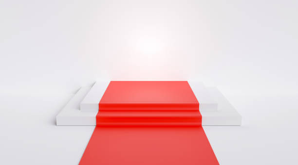 istock White square podium, red carpet on white stairs. 1417666494