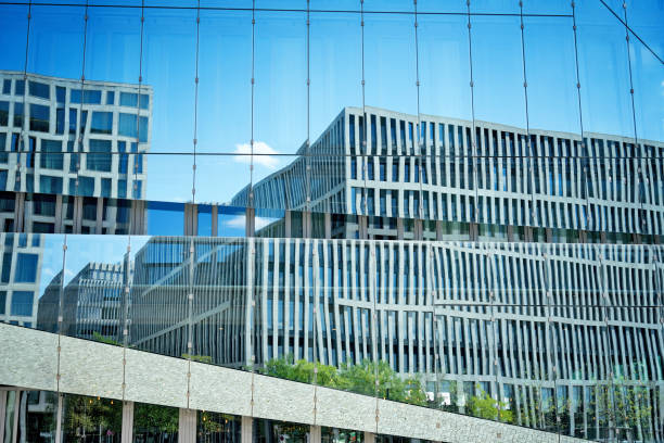 istock Glass Office building facade with Distorted reflections, central Berlin, Germany 1417668292