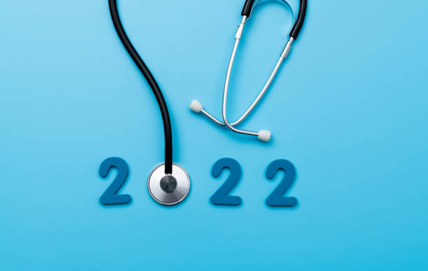 istock Stethoscope and number 2022 on blue background 1417670795