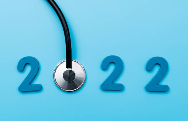 istock Stethoscope and number 2022 on blue background 1417670818