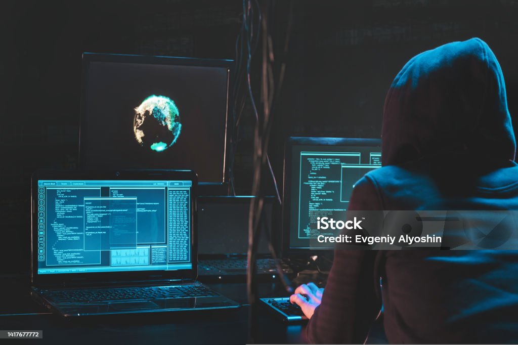 Hacking Software Collection Back Hooded Hacker Using Malicious Software Hack Corporate Data Center ...