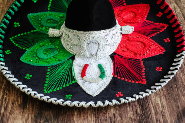 istock Mexican charro hat on wooden table. 1417679831
