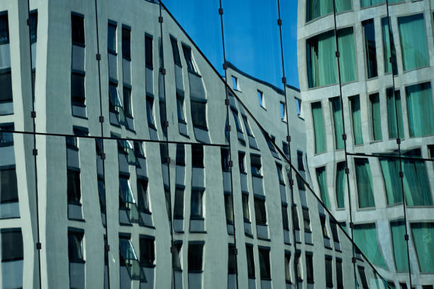 istock Glass Office building facade with Distorted reflections, central Berlin, Germany 1417686308