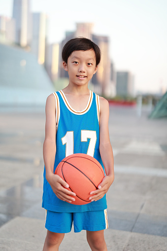 Little asian basketball player