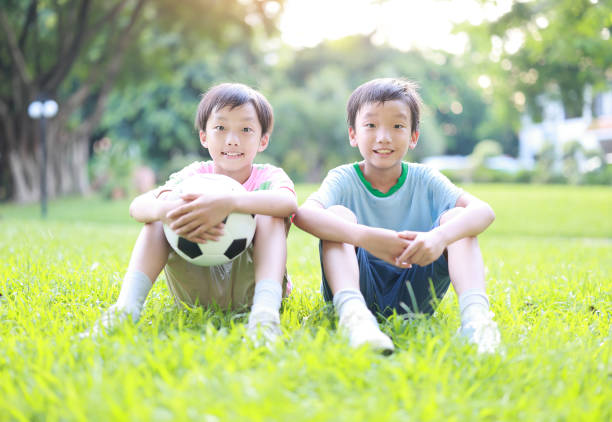istock Boy with soccer ball 1417692436