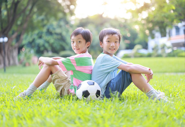 istock Boy with soccer ball 1417692449