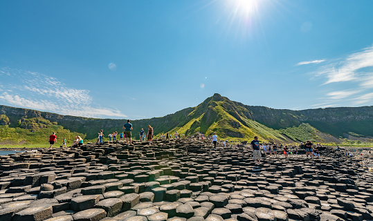 Ballycastle, Northern Ireland. 13 August 2022. Crowds of people in mass tourism at Giant's Causeway, Northern Ireland