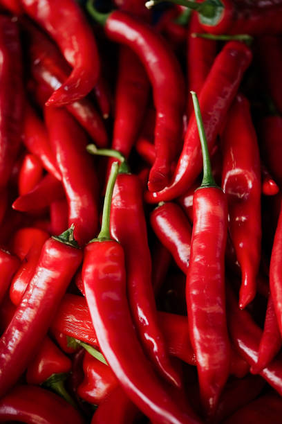 istock Ripe red chili pepper close-up background 1417695372
