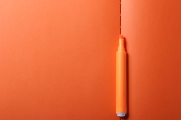 istock Mark pen on yellow background 1417696550