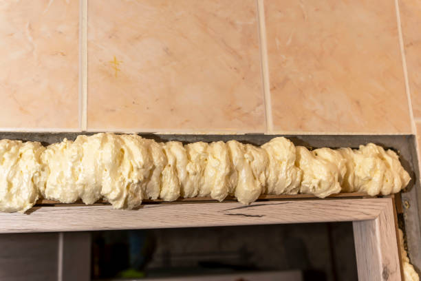 dried Construction mounting foam between the door frame and the wall.
