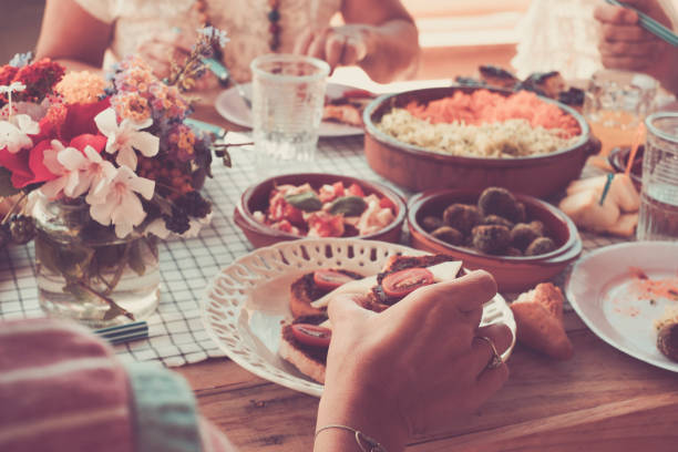 istock Cropped Image Of People Having Food 1417699295