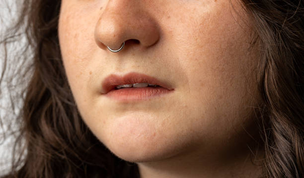 istock Young woman with nose ring 1417700071