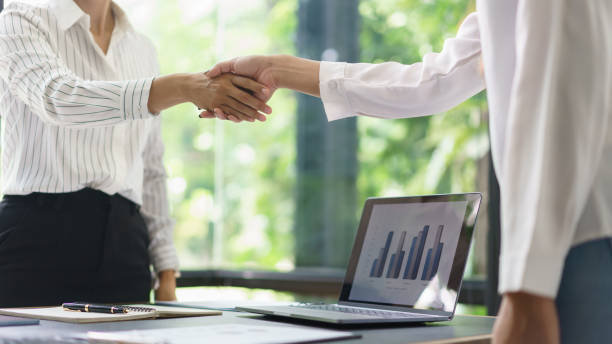 istock Midsection Of Business Colleagues Working At Office 1417700220
