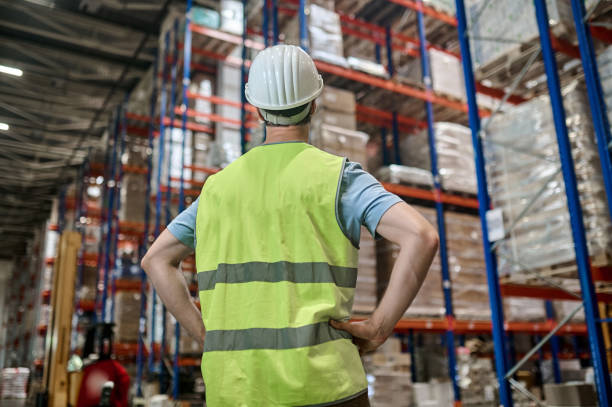 istock Storehouse employee inspecting merchandise on the pallets 1417700564