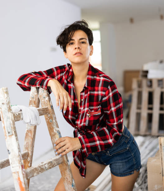 istock Sexy woman posing in building site 1417704182