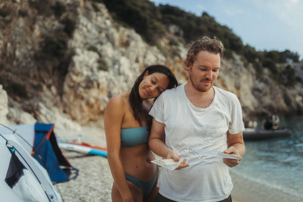 istock Young couple enjoy summer beach vacation 1417705541
