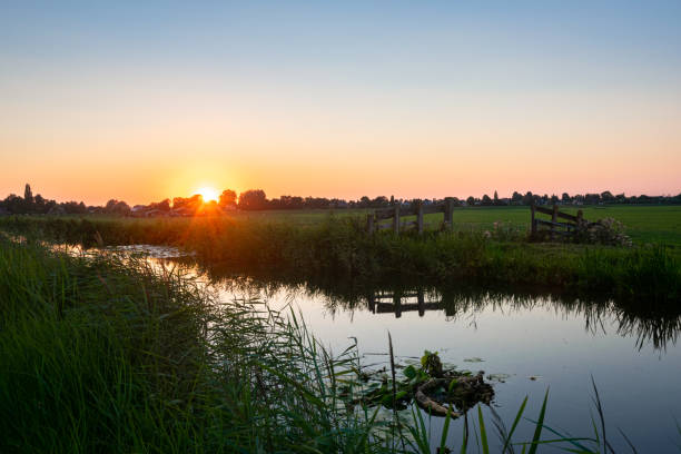 istock Sunset over the idyllic Dutch polder landscape 1417705635