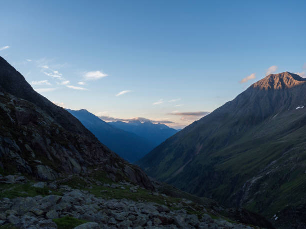 istock Evening view from Nurnberger Hutte mountain hut at valley with sharp mountain peaks at Stubai hiking trail, Stubai Hohenweg, Summer rocky alpine landscape of Tyrol, Stubai Alps, Austria 1417716757