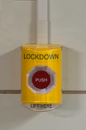 A lockdown alarm button in an American (USA) high school. These are placed around the school halls in case of any dangerous incident, including an active shooter.