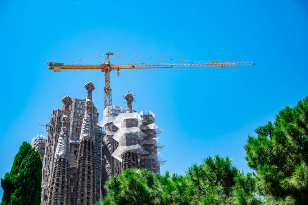A blank billboard on a scaffolding covering a cathedral. Barcelona, Spain.